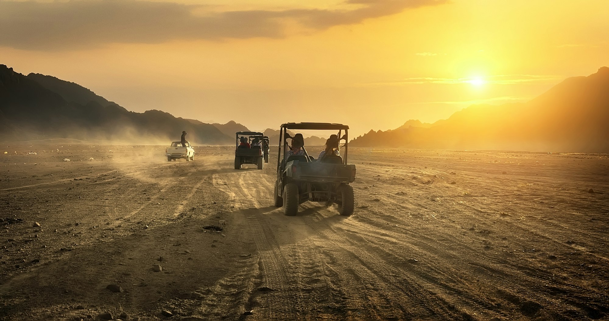 Buggy riding in desert