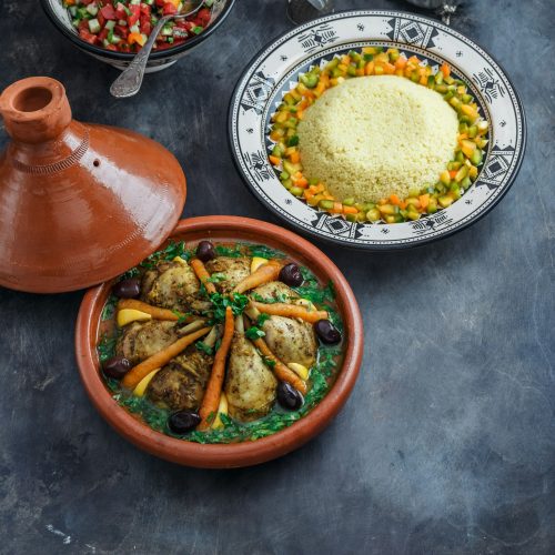 Moroccan tajine with chicken and carrots, copy space