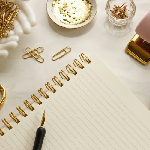 Pink and gold office supplies desk
