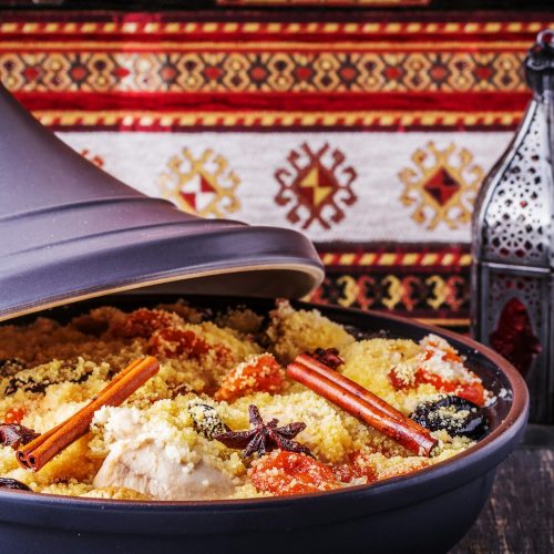 Traditional moroccan tajine of chicken with dried fruits and spices.